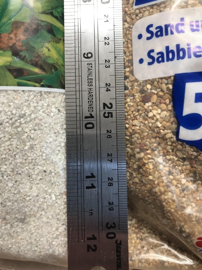 measuring gravel volume using a ruler